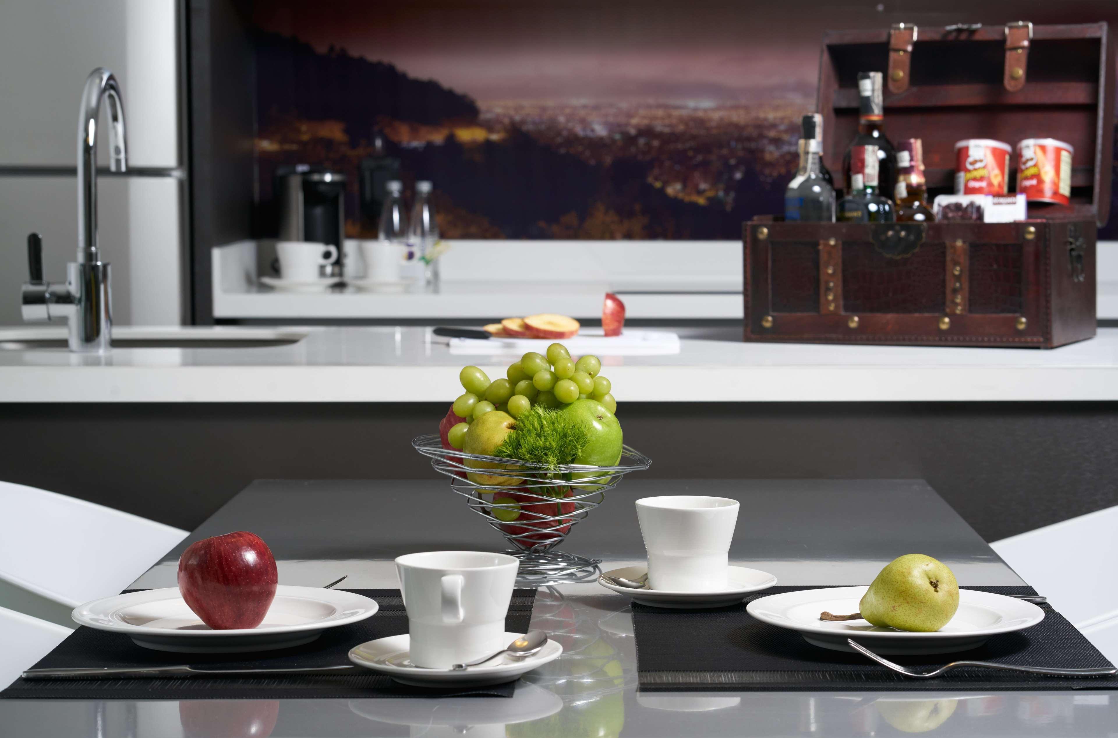 Hotel 100 Luxury Suites By Preferred بوغوتا المظهر الخارجي الصورة A kitchen with a built-in coffee machine