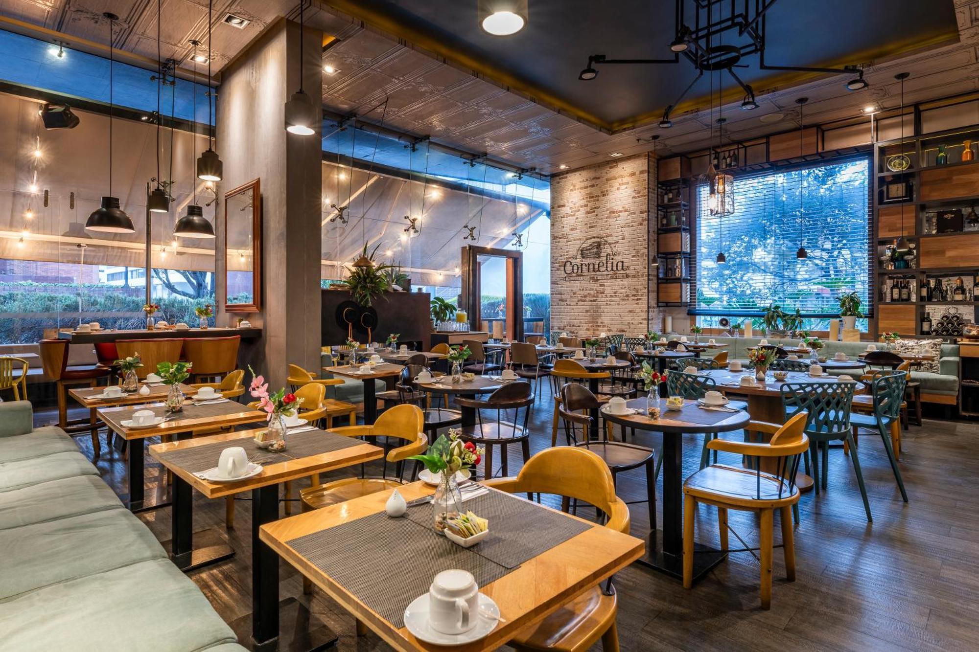 Hotel 100 Luxury Suites By Preferred بوغوتا المظهر الخارجي الصورة Restaurant in the hotel