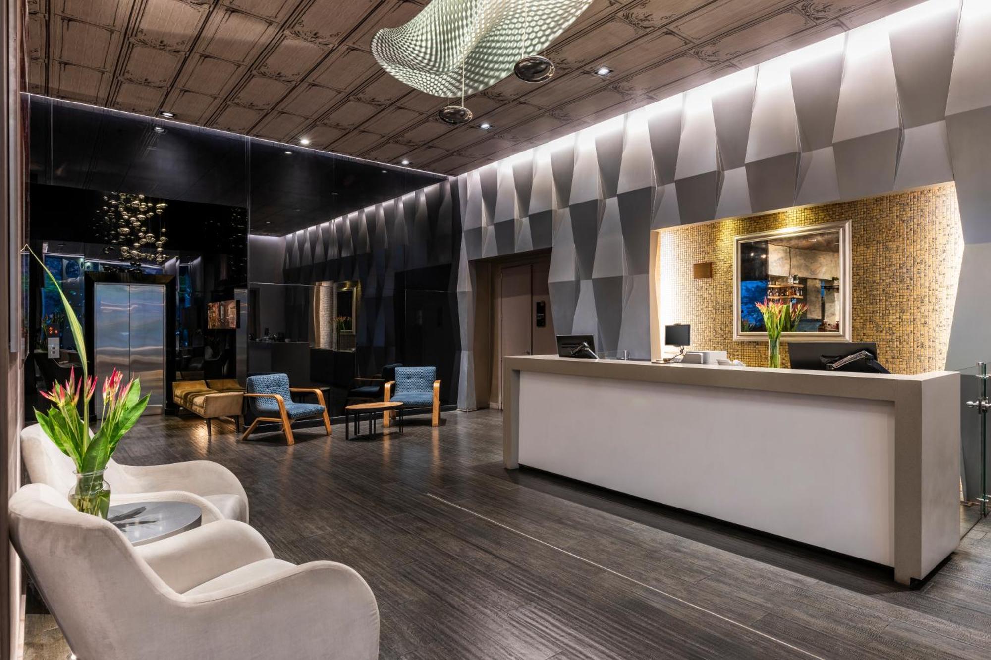 Hotel 100 Luxury Suites By Preferred بوغوتا المظهر الخارجي الصورة The lobby of the hotel