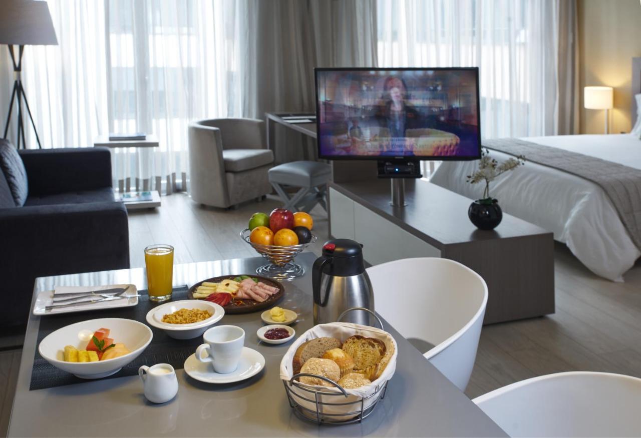 Hotel 100 Luxury Suites By Preferred بوغوتا المظهر الخارجي الصورة A room at the hotel